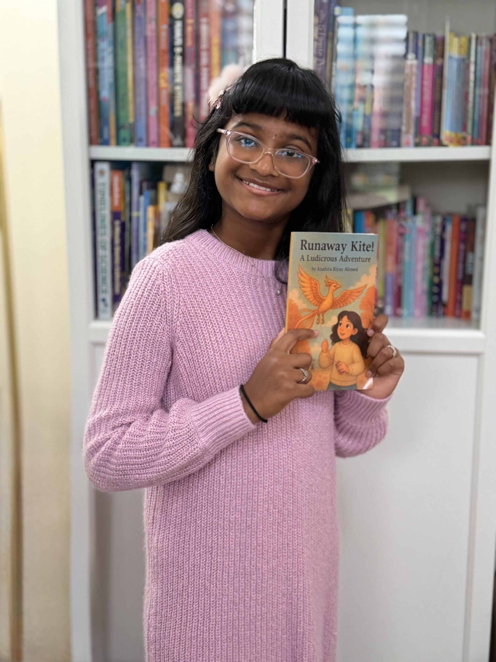 Anahita with newly published book Runaway Kite!: A Ludicrous Adventure. Adventures with Anahita, Questa Elementary School