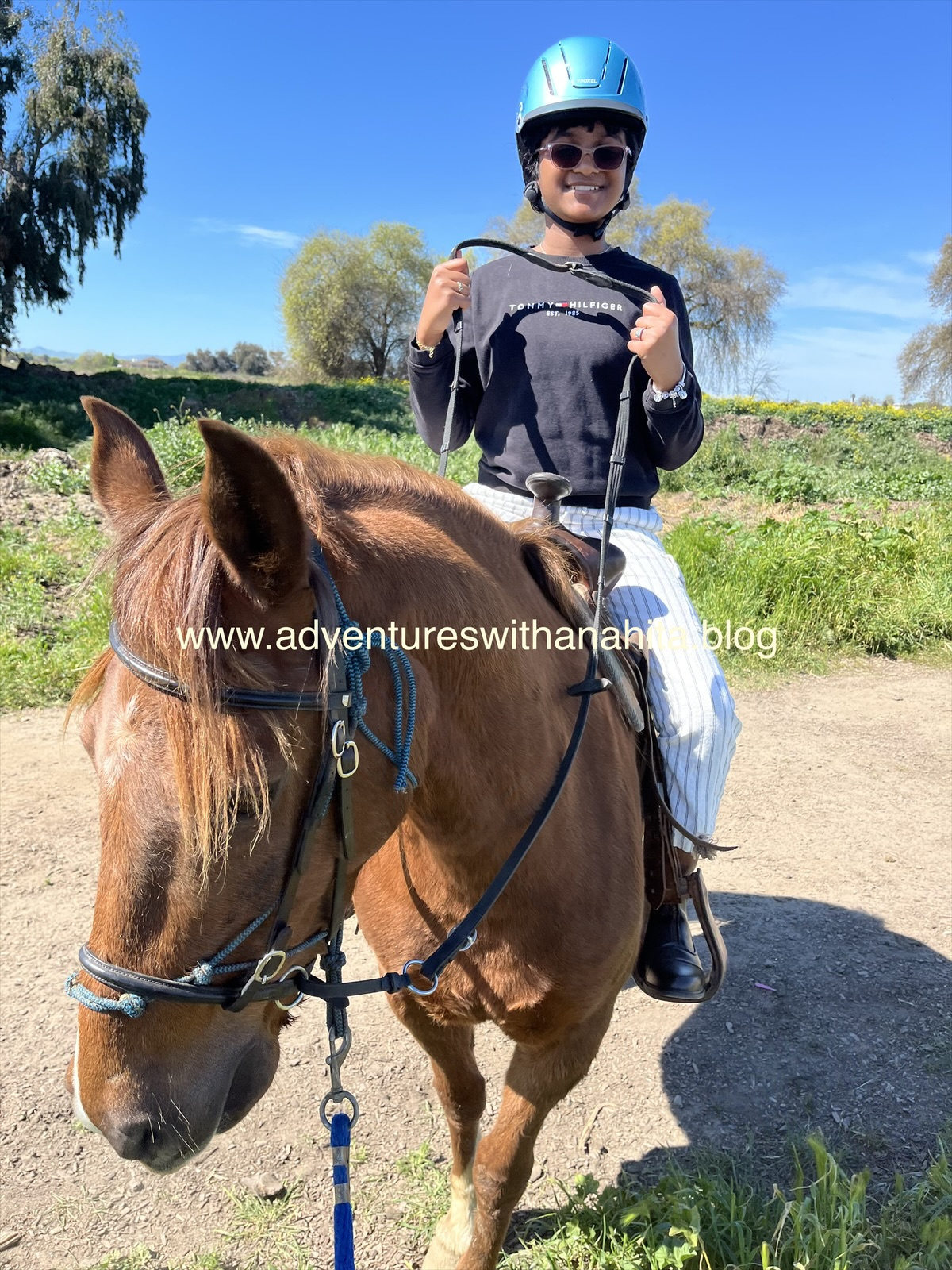 Anahita Riyaz Ahmed riding Rosie the auburn horse during her horseback riding class – Adventures with Anahita blog